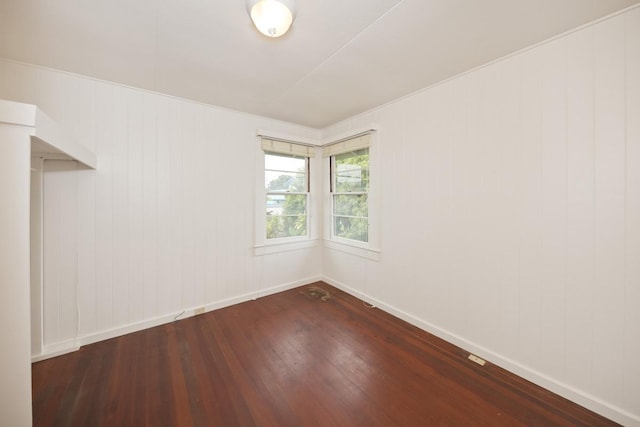 1969-A Kilauea Ave, Hilo, HI 96720 - unfurnished room featuring dark wood-type flooring and baseboards