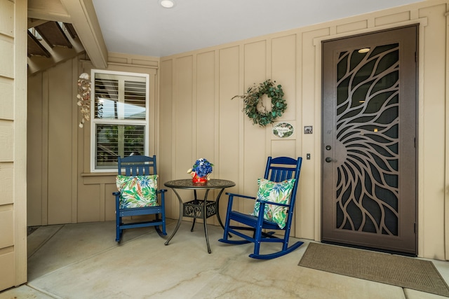 2611 Kiahuna Plantation Dr Unit 13D, Koloa, HI 96756 - doorway to property featuring board and batten siding