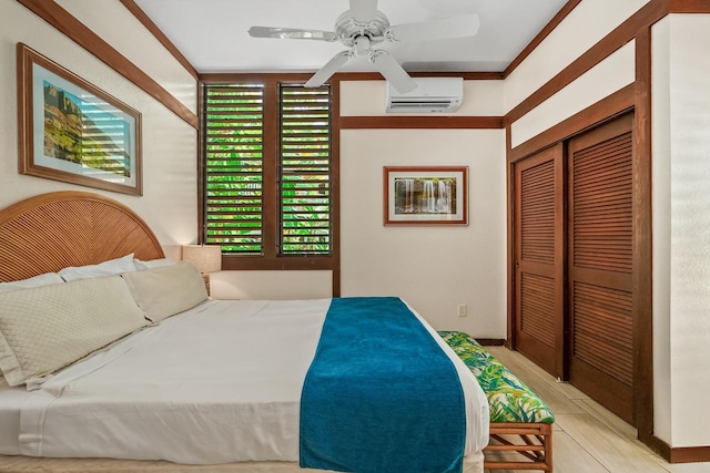 2253 Poipu Rd Unit 115, Koloa, HI 96756 - bedroom with a wall mounted air conditioner, a closet, and ceiling fan
