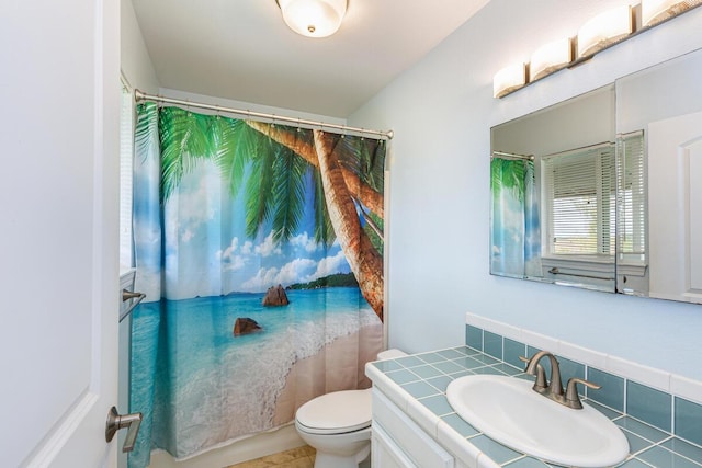 5372 Kumole St, Kapaa, HI 96746 - full bathroom with vanity, toilet, curtained shower, and decorative backsplash
