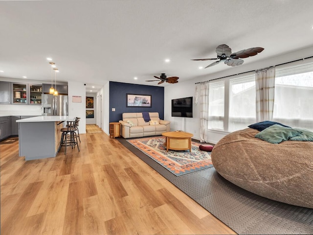 28-2855 Onomea Pl, Pepeekeo, HI 96783 - living room with light wood-style flooring, recessed lighting, and a ceiling fan