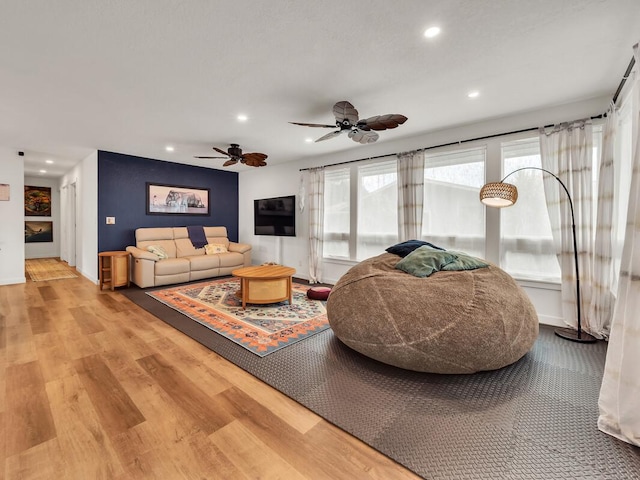 28-2855 Onomea Pl, Pepeekeo, HI 96783 - living room with recessed lighting, wood finished floors, and ceiling fan