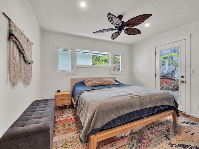 28-2855 Onomea Pl, Pepeekeo, HI 96783 - bedroom featuring wood finished floors, recessed lighting, access to outside, and a ceiling fan