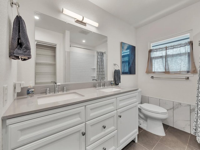 28-2855 Onomea Pl, Pepeekeo, HI 96783 - bathroom with double vanity, tile patterned floors, and a shower with curtain