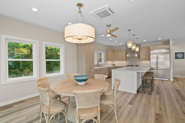4576 Emmalani Dr, Princeville, HI 96722 - dining area featuring light wood-style floors, recessed lighting, a ceiling fan, and baseboards