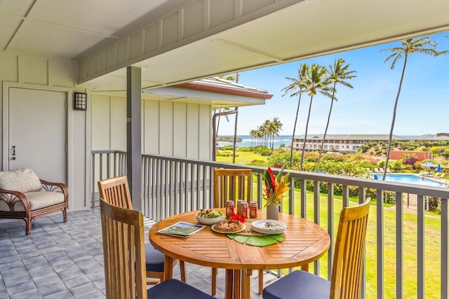 1565 Pee Rd Unit 221, Koloa, HI 96756 - balcony featuring a water view and view of pool area