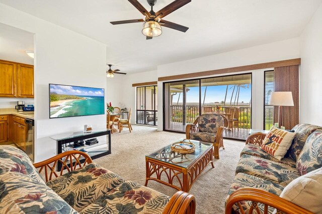 1565 Pee Rd Unit 221, Koloa, HI 96756 - living room with a ceiling fan and light colored carpet