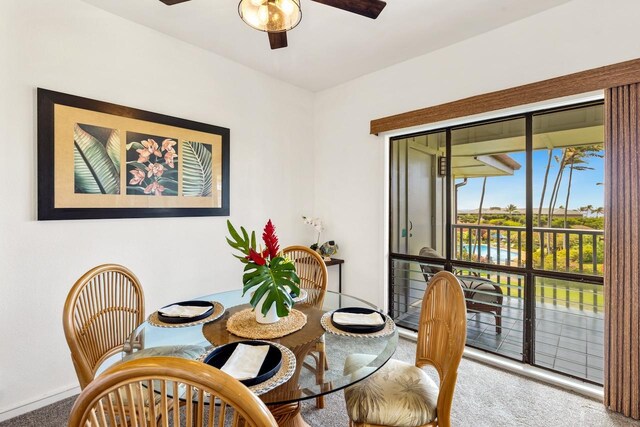 1565 Pee Rd Unit 221, Koloa, HI 96756 - dining space with carpet and a ceiling fan