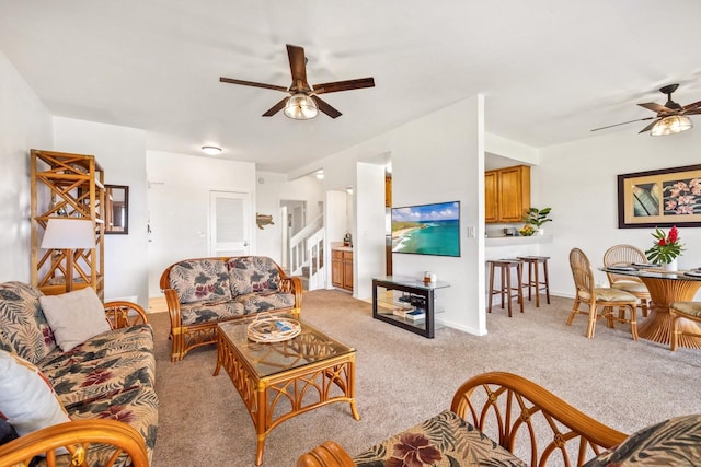 1565 Pee Rd Unit 221, Koloa, HI 96756 - living area featuring ceiling fan, light carpet, and baseboards