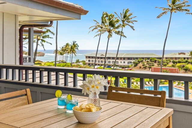 1565 Pee Rd Unit 221, Koloa, HI 96756 - balcony featuring a water view and view of pool area