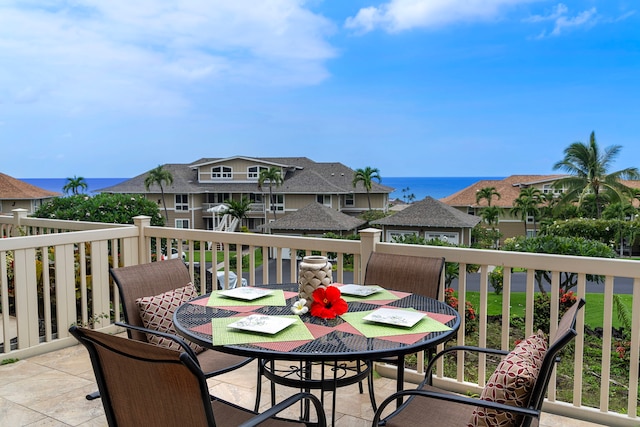 75-6060 Kuakini Hwy Unit B1, Kailua-Kona, HI 96740 - balcony with outdoor dining area and a water view