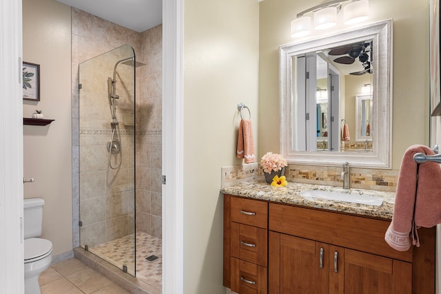 75-6060 Kuakini Hwy Unit B1, Kailua-Kona, HI 96740 - full bathroom with vanity, tiled shower, tile patterned floors, and a ceiling fan