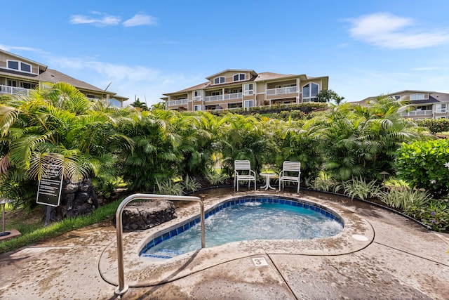 75-6060 Kuakini Hwy Unit B1, Kailua-Kona, HI 96740 - view of swimming pool with a community hot tub