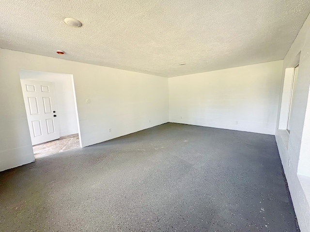 16-2122 Ginger Ln, Pahoa, HI 96778 - unfurnished room with a textured ceiling
