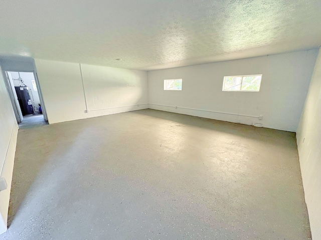 16-2122 Ginger Ln, Pahoa, HI 96778 - spare room with concrete floors and a textured ceiling