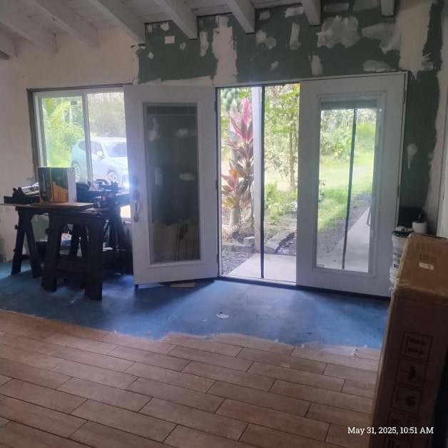 13-3313 Moku St, Pahoa, HI 96778 - doorway to outside featuring beamed ceiling and plenty of natural light