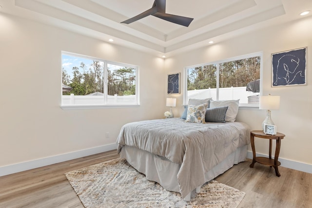 16-2068 Bamboo Dr, Pahoa, HI 96778 - bedroom featuring a raised ceiling, baseboards, wood finished floors, recessed lighting, and a ceiling fan