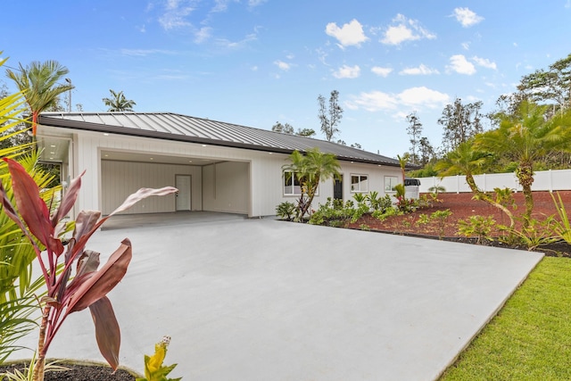 16-2068 Bamboo Dr, Pahoa, HI 96778 - ranch-style home featuring driveway, a standing seam roof, and metal roof
