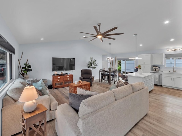 11-3073 Puolani St, Volcano, HI 96785 - living area featuring lofted ceiling, a ceiling fan, light wood-style floors, and recessed lighting