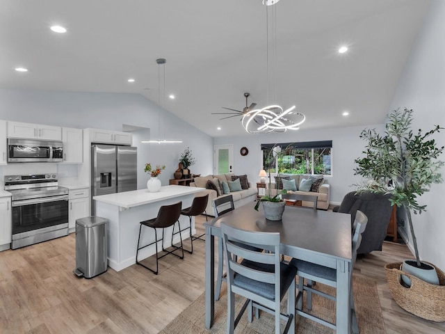 11-3073 Puolani St, Volcano, HI 96785 - dining room with vaulted ceiling, a chandelier, light wood-style floors, and recessed lighting