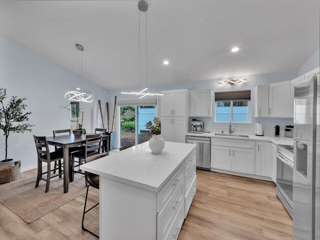 11-3073 Puolani St, Volcano, HI 96785 - kitchen featuring stainless steel appliances, a sink, healthy amount of natural light, light wood-type flooring, and recessed lighting