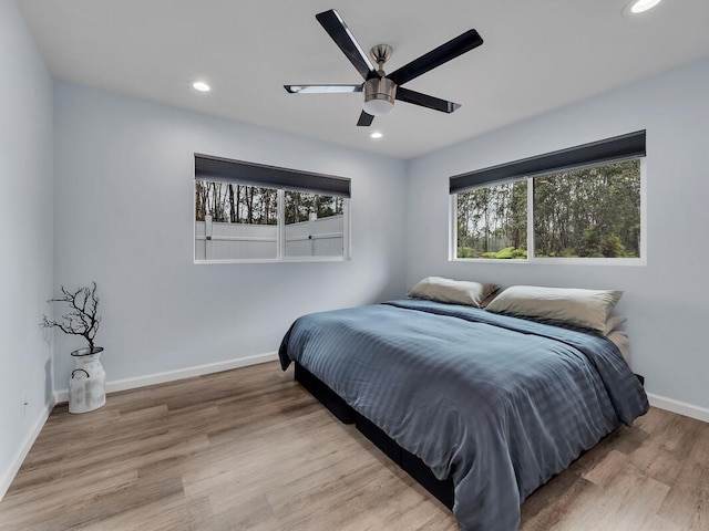 11-3073 Puolani St, Volcano, HI 96785 - bedroom with recessed lighting, wood finished floors, baseboards, and a ceiling fan