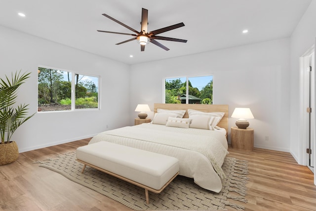 15-1770 10th Ave, Keaau, HI 96749 - bedroom featuring multiple windows, recessed lighting, light wood-style flooring, and baseboards