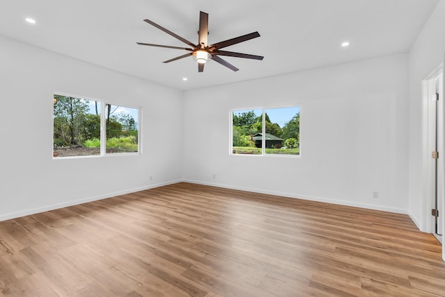 15-1770 10th Ave, Keaau, HI 96749 - unfurnished room featuring healthy amount of natural light, recessed lighting, ceiling fan, and light wood-type flooring