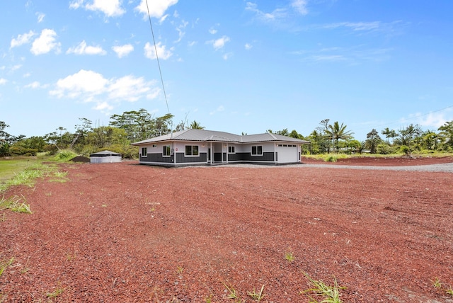 15-1770 10th Ave, Keaau, HI 96749 - ranch-style home featuring an attached garage and a porch