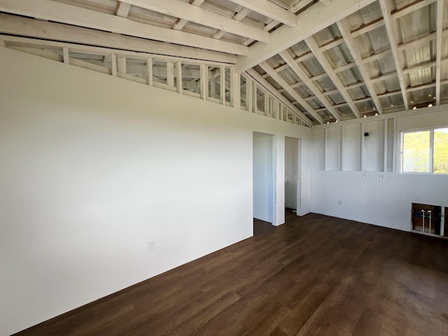 94-6479 Puukani Rd, Naalehu, HI 96772 - unfurnished room with dark wood finished floors and lofted ceiling