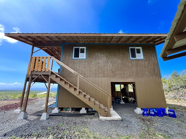 94-6479 Puukani Rd, Naalehu, HI 96772 - back of property featuring metal roof and stairs