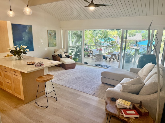 78-7039 Kamehameha Iii Rd Unit 148, Kailua-Kona, HI 96740 - living room with lofted ceiling, ceiling fan, light wood finished floors, and wood ceiling