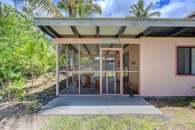 12-7040 Kaihalulu St, Pahoa, HI 96778 - view of patio featuring a sunroom