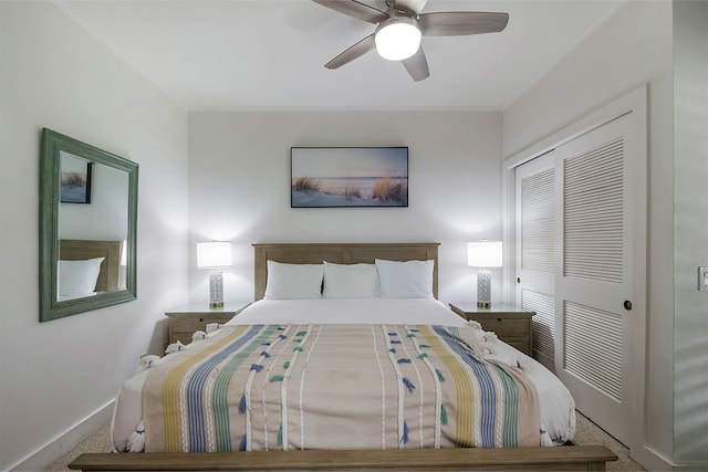 2253 Poipu Rd Unit 230, Koloa, HI 96756 - bedroom featuring carpet, a closet, ornamental molding, and ceiling fan
