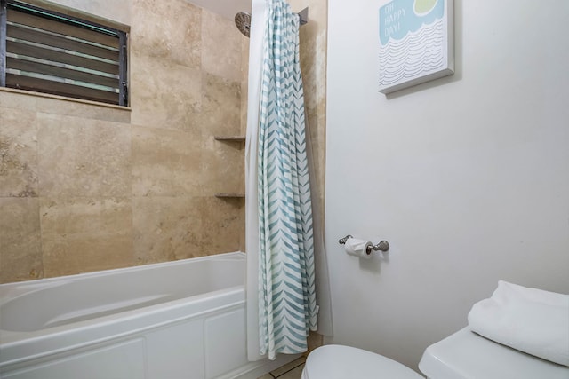 2253 Poipu Rd Unit 230, Koloa, HI 96756 - bathroom featuring shower / tub combo with curtain and tile patterned flooring