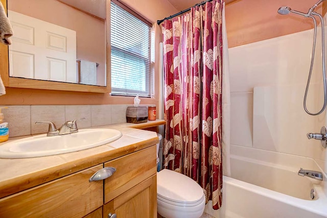 12-7036 Kaiwa St, Pahoa, HI 96778 - full bathroom with vanity, toilet, shower / tub combo, and backsplash