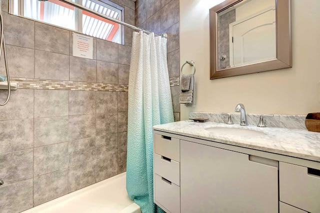 12-7036 Kaiwa St, Pahoa, HI 96778 - bathroom with vanity and shower / bath combination with curtain