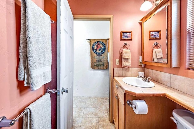12-7036 Kaiwa St, Pahoa, HI 96778 - bathroom featuring toilet, vanity, and tile patterned floors