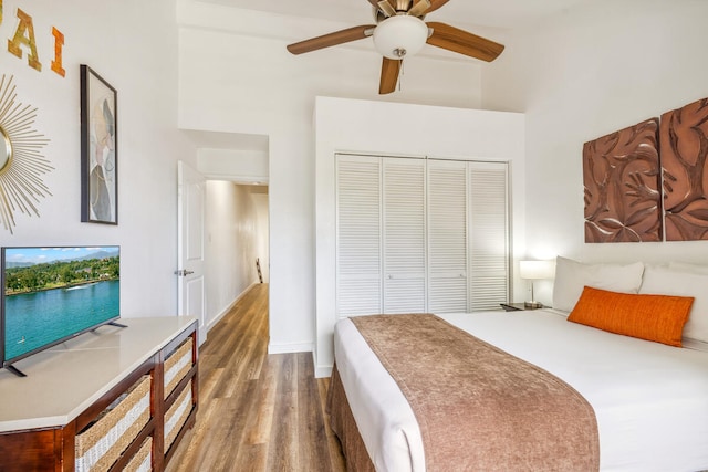 3411 Wilcox Rd Unit F 69, Lihue, HI 96766 - bedroom with a high ceiling, wood finished floors, a closet, and ceiling fan