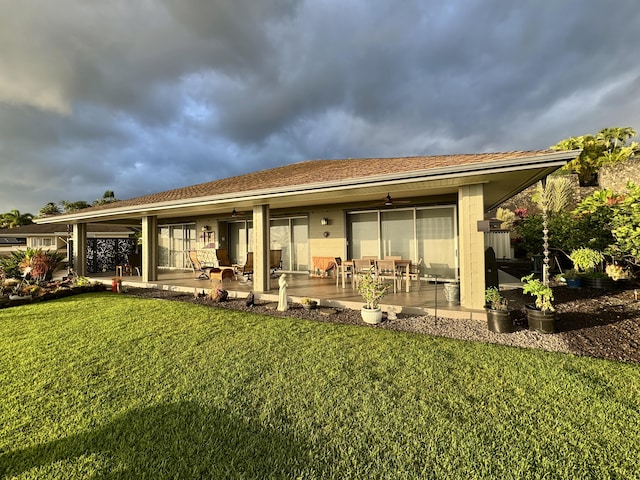 76-4391 Leilani St, Kailua-Kona, HI 96740 - rear view of house featuring a yard, a patio, and a ceiling fan