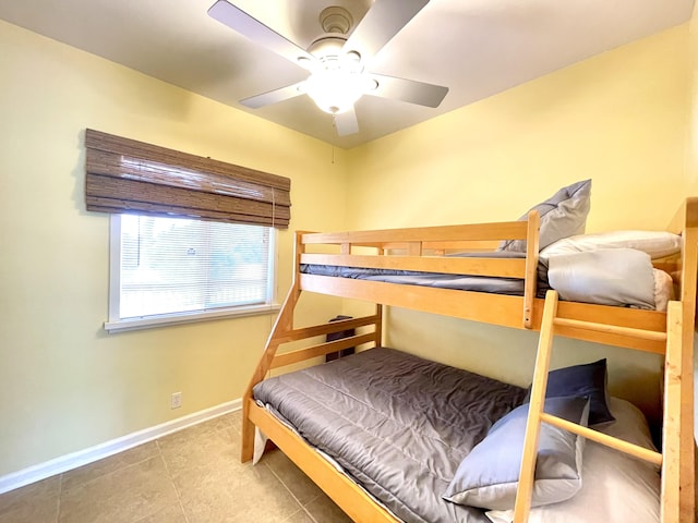 95-5974-A Mamalahoa Hwy, Naalehu, HI 96772 - bedroom featuring baseboards, tile patterned flooring, and a ceiling fan