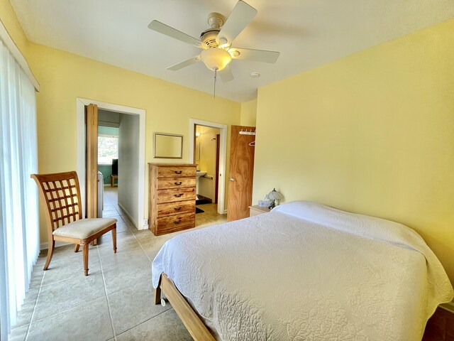 95-5974-A Mamalahoa Hwy, Naalehu, HI 96772 - bedroom with light tile patterned floors and a ceiling fan