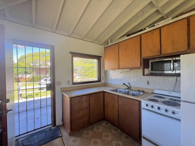 95-5974-A Mamalahoa Hwy, Naalehu, HI 96772 - kitchen with white appliances, a sink, light countertops, backsplash, and brown cabinets