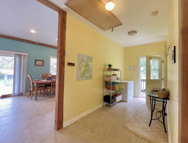 95-5974-A Mamalahoa Hwy, Naalehu, HI 96772 - hallway featuring attic access, light tile patterned floors, and baseboards