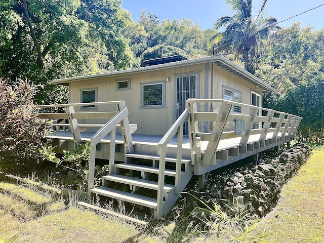 95-5974-A Mamalahoa Hwy, Naalehu, HI 96772 - rear view of property with a deck and stairs