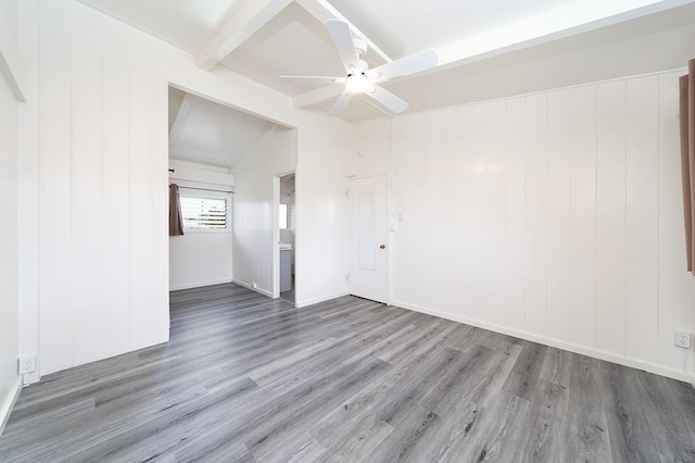 4 Nani Pl, Hilo, HI 96720 - unfurnished room featuring wood finished floors, a ceiling fan, and beam ceiling