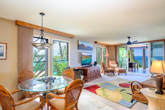 76-6212 Alii Dr Unit 205, Kailua-Kona, HI 96740 - dining room with healthy amount of natural light and ceiling fan
