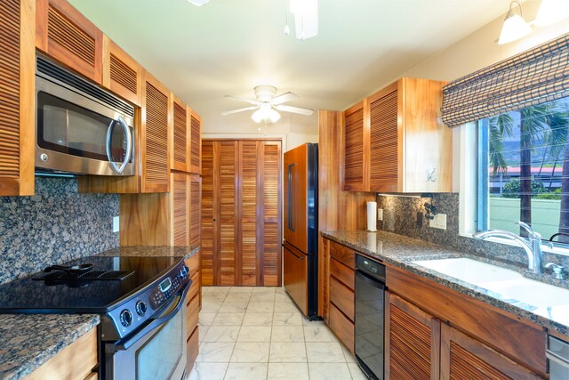 76-6212 Alii Dr Unit 205, Kailua-Kona, HI 96740 - kitchen featuring black range with electric cooktop, stainless steel microwave, high end refrigerator, light marble finish flooring, and backsplash