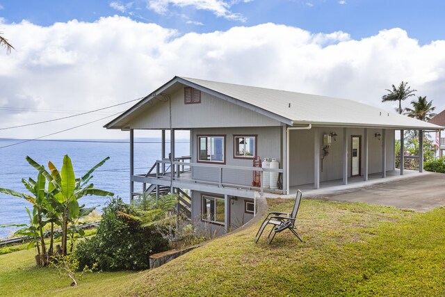 36-2331 Old Mamalahoa Hwy, Laupahoehoe, HI 96764 - back of house with a yard, a water view, and metal roof