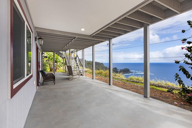 36-2331 Old Mamalahoa Hwy, Laupahoehoe, HI 96764 - view of patio / terrace with stairway and a water view